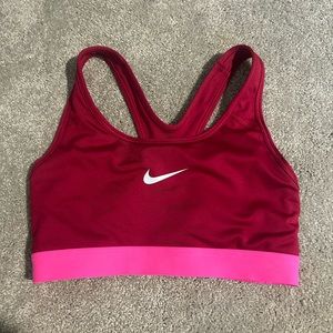 Pink and Red Nike sports bra